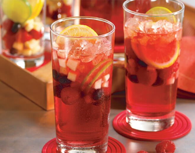 Fruit-infused berry beverage with ice